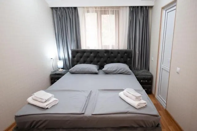  Hovasapyan's Family Guest House - picture  : Bed,Bed,Bedroom,towels,Property,Room 