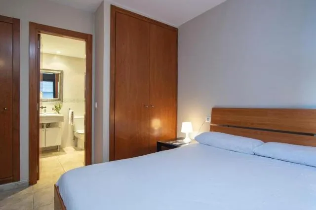  Apartamentos Tarter 3000 - picture  : Bed,Bed,Photo of the whole room,Bedroom,wardrobe,Property,Room 