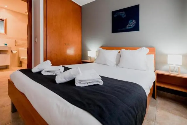  Apartamentos Tarter 3000 - picture  : Bed,Bed,Photo of the whole room,Bedroom,towels,Property,Room 