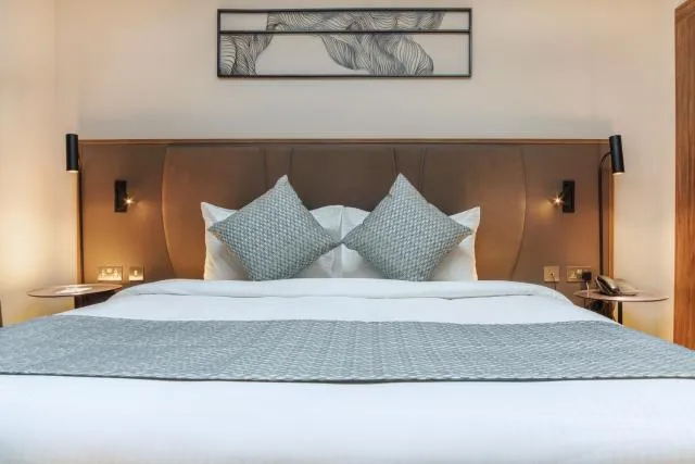  Hotel Holiday International - picture  : Bed,Bed,Room 