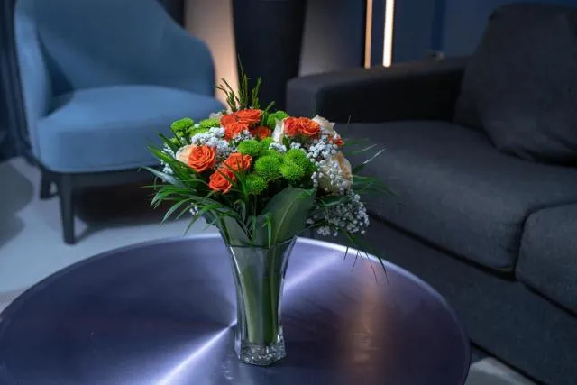  Hotel Holiday International - picture  : Seating area,Living room,Property 