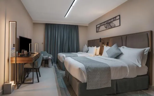  Hotel Holiday International - picture  : Bed,Bed,Room 