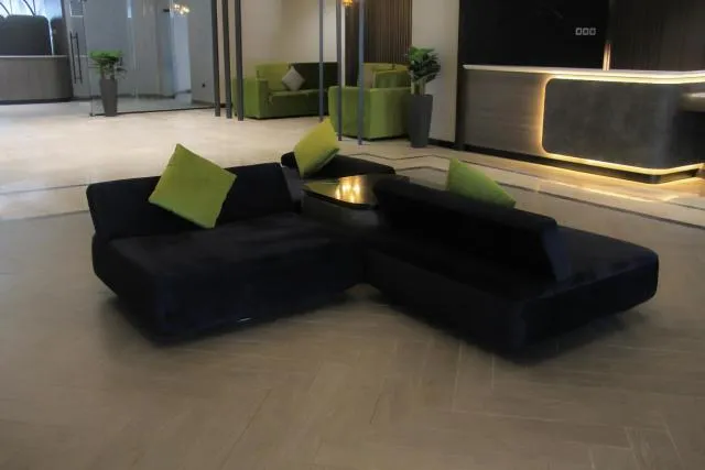  Hotel Holiday International - picture  : Nearby landmark,Seating area,Seating area,Property 