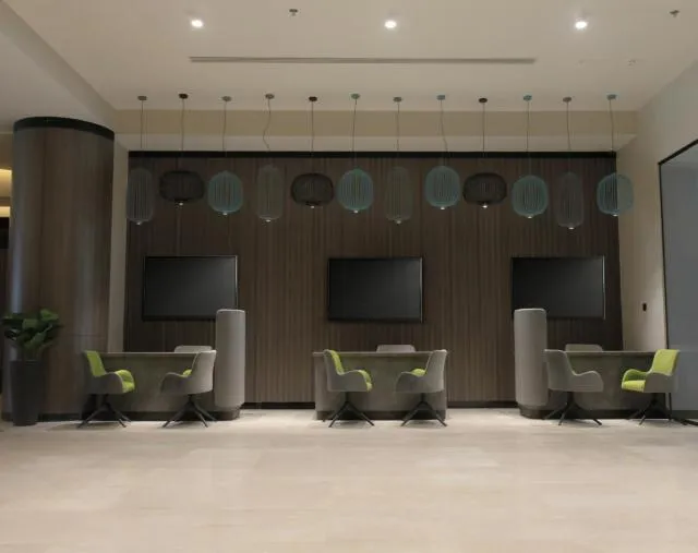  Hotel Holiday International - picture  : Lobby or reception,Property 