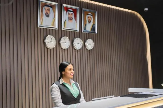  Hotel Holiday International - picture  : Nearby landmark,Lobby or reception,Property 