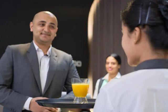  Hotel Holiday International - picture  : Kitchen/kitchenette,Property 