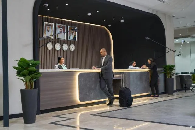  Hotel Holiday International - picture  : Lobby or reception,Property 