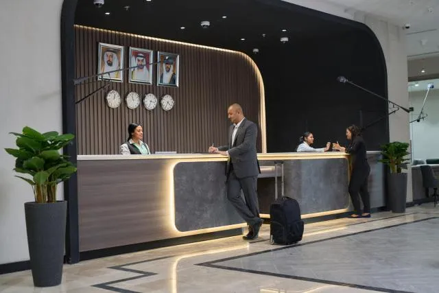  Hotel Holiday International - picture  : Lobby or reception,Property 