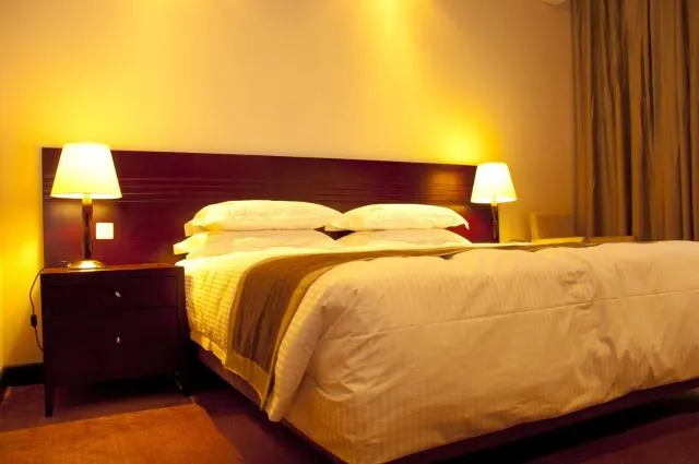  Gorillas Golf Hotel - photo  : Lit,Chambre à coucher,Propriété 