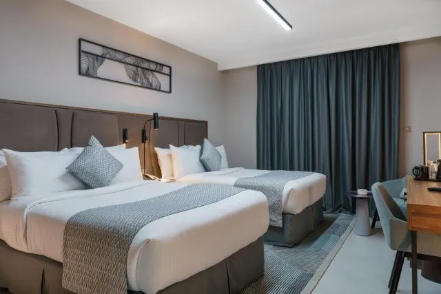  Hotel Holiday International - picture  : Bed,Bed,Room 