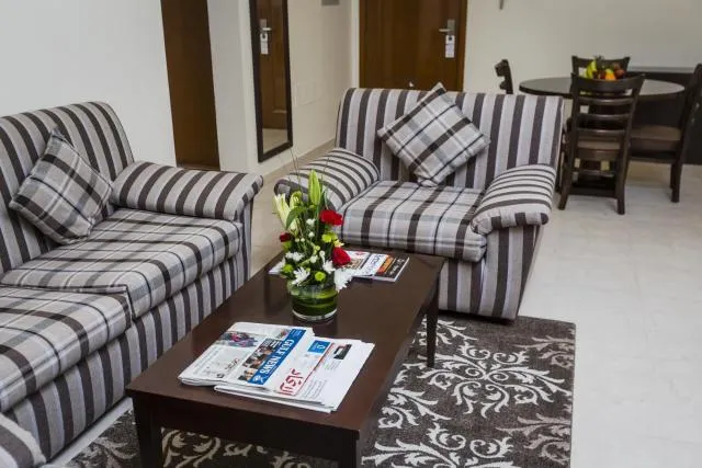  Arabian Dreams Hotel Apartments - picture  : Seating area,Living room,Property 