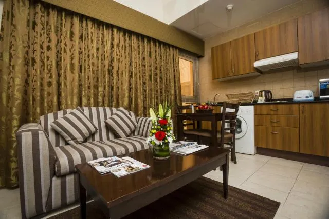  Arabian Dreams Hotel Apartments - picture  : Kitchen/kitchenette,Seating area,Kitchen or kitchenette,Living room,Property 