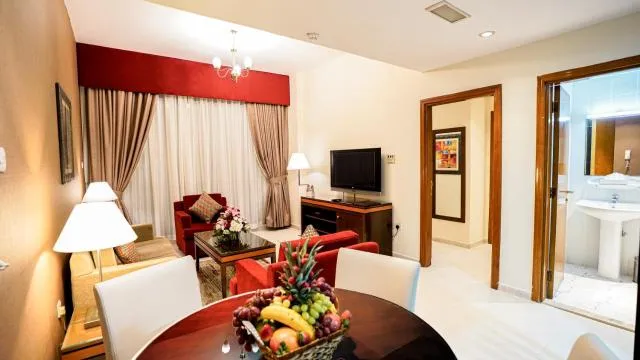  Xclusive Hotel Apartments - picture  : Seating area,TV/entertainment centre 