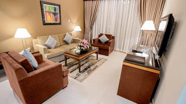  Xclusive Hotel Apartments - picture  : Seating area,Living room,Property 