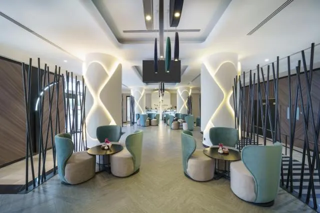  Hotel Holiday International - picture  : Coffee/tea facilities,Property 