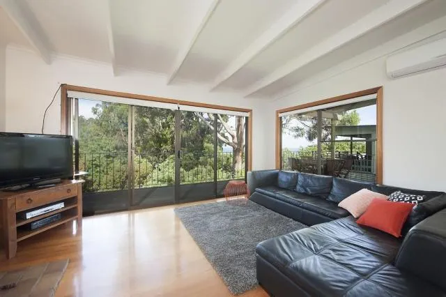  At Riverside - picture  : Seating area,TV/entertainment centre 