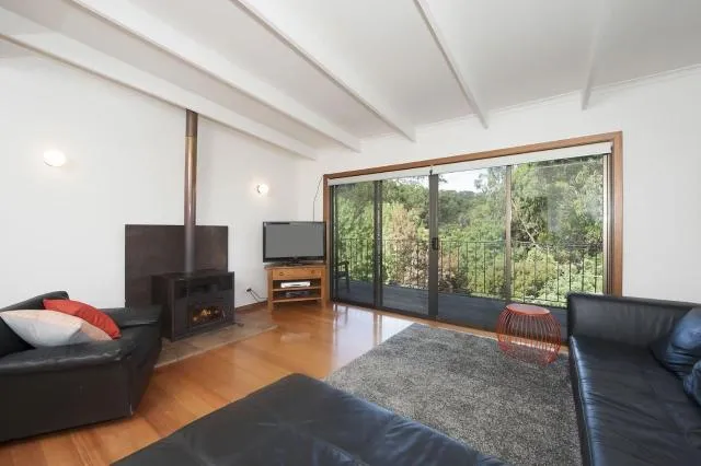  At Riverside - picture  : Seating area,TV/entertainment centre 