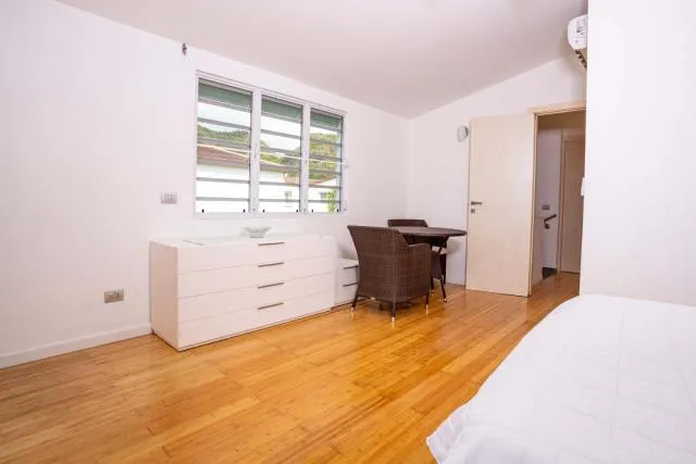  Antigua chiama Italia villas - picture  : Seating area,Bed,Bedroom,Property,Room 