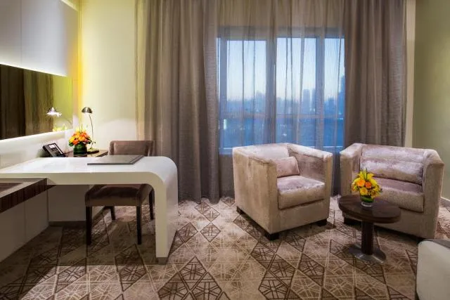  Elite Byblos Hotel - picture  : Seating area,View (from property/room),Decorative detail,Seating area,Bedroom,City view,Property 