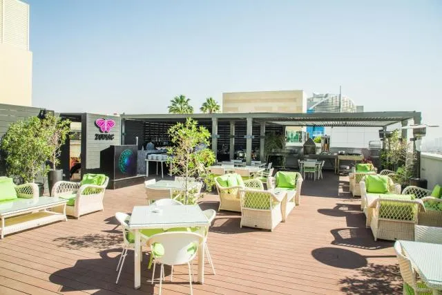  Elite Byblos Hotel - picture  : Toilet,Restaurant/places to eat,Day,Balcony/Terrace,Lounge or bar,Food and drinks,Decorative detail,Seating area,Dining area,Food,hair dresser,Property 