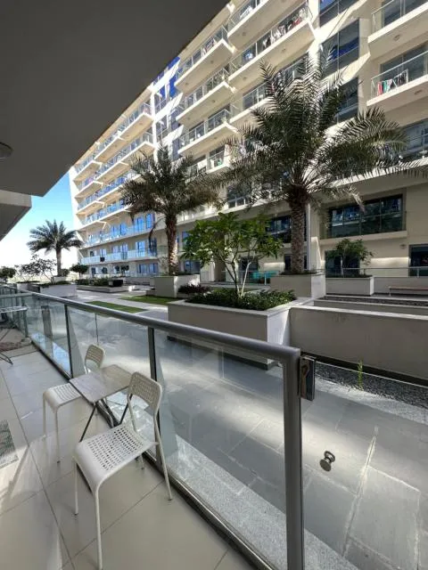  Beautiful apartment by the sea - picture  : Property building,Swimming pool,View (from property/room),Seating area,Property 