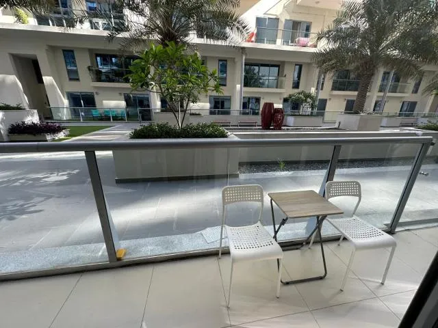  Beautiful apartment by the sea - picture  : Property building,Swimming pool,View (from property/room),Balcony/Terrace,Seating area,Property 