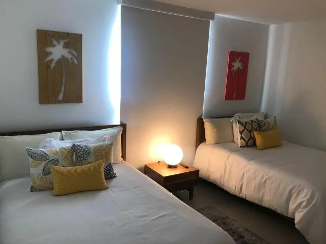  Stunning beachfront apartment with private jacuzzi - picture  : Seating area,Bed 