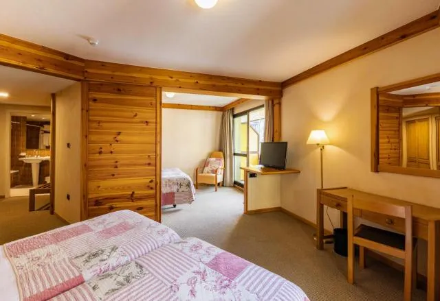  Hotel Bonavida - picture  : TV/entertainment centre,Photo of the whole room,Room 