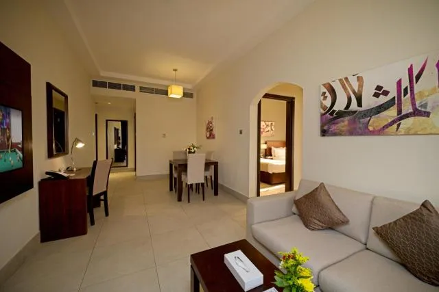  Action Hotel Ras Al Khaimah - picture  : Seating area,Living room,Seating area,Dining area,Bedroom,Property 