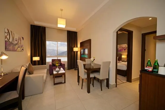  Action Hotel Ras Al Khaimah - picture  : Living room,Seating area,Dining area,Property 