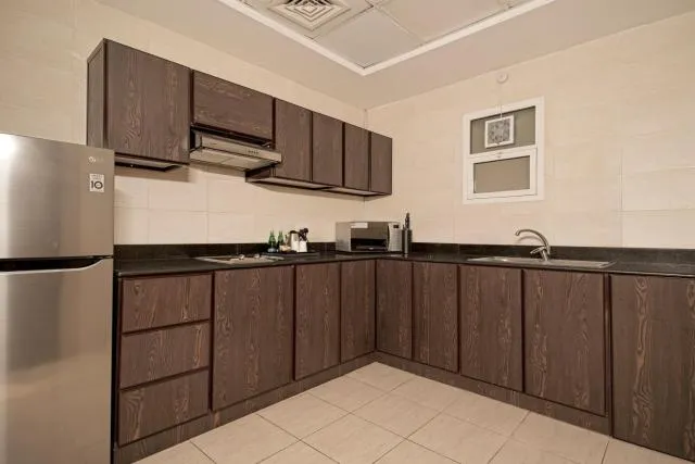  Action Hotel Ras Al Khaimah - picture  : Kitchen/kitchenette,Kitchen or kitchenette,minibar,stove,Property 