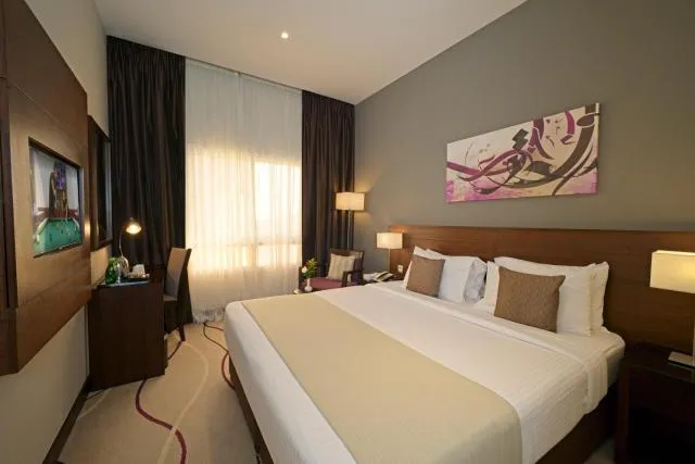 Action Hotel Ras Al Khaimah - picture  : Bed,Bed,Bedroom,Property,Room 