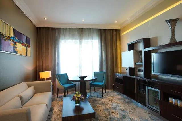  Elite Byblos Hotel - picture  : Seating area,TV/entertainment centre,Living room,Property 