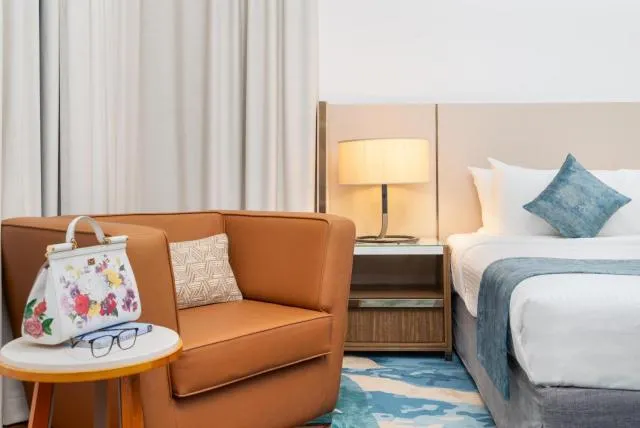  Golden Sands Hotel & Residences - picture  : Seating area,Bedroom,Property 