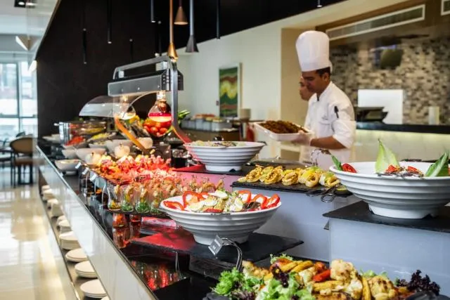  Elite Byblos Hotel - picture  : Kitchen/kitchenette,Restaurant/places to eat,BBQ facilities,Day,Food and drinks,Decorative detail,Dining area,Food,Lunch,Property 