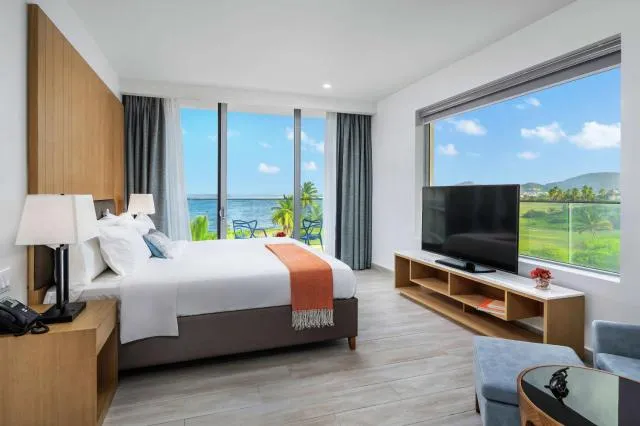  Koi Resort Saint Kitts, Curio Collection by Hilton - picture  : TV/entertainment centre,Bedroom,Property 