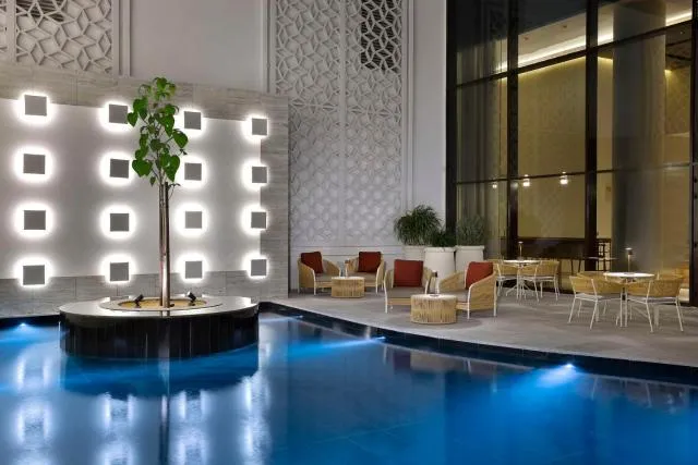  Hilton Abu Dhabi Yas Island - photo  : Piscine,Salon ou bar,Propriété 