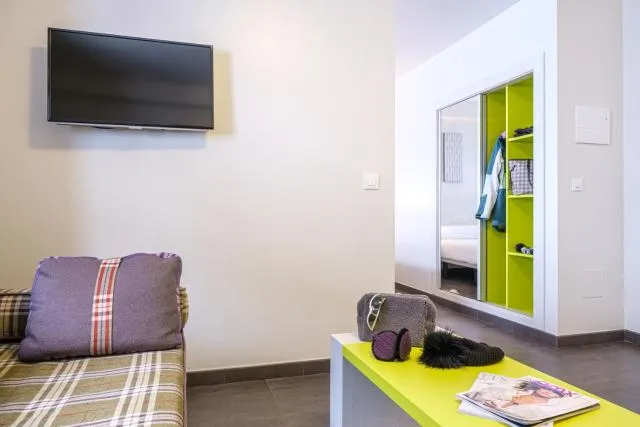  Hotel Cristina - picture  : Seating area,TV/entertainment centre,Photo of the whole room,Room 