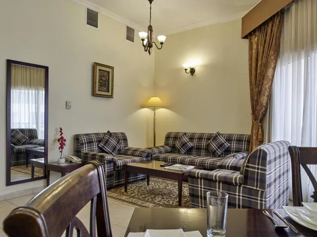 Arabian Dreams Hotel Apartments - picture  : Seating area,Living room,Property 