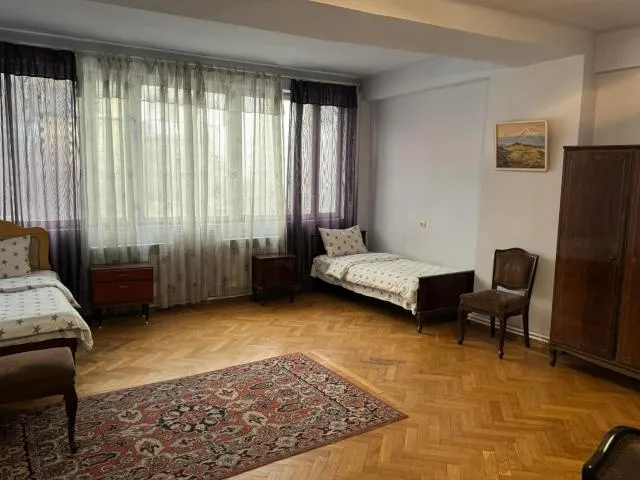  Apartments on Sarmen - picture  : Seating area,TV/entertainment centre,Bed,Bed,Bedroom,hair dresser,Property,Room 