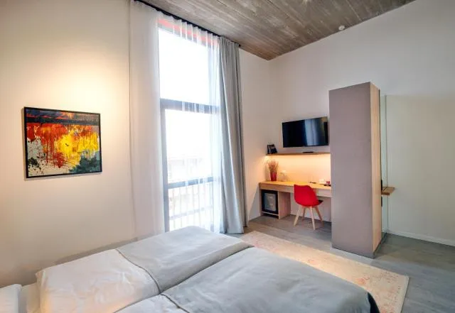  Armine's B&B - picture  : TV/entertainment centre,Bed,Bed,TV and multimedia,Bedroom,oven,wardrobe,Property,Room 