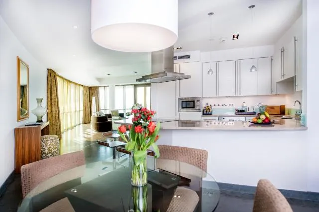  Burjuman Arjaan by Rotana - Dubai - picture  : Kitchen/kitchenette,Dining area,Kitchen or kitchenette,Photo of the whole room,Seating area,Dining area,Property,Room 