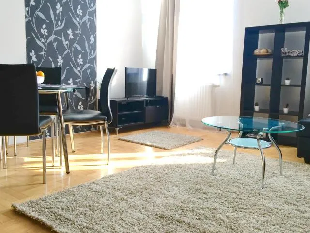  Gozsdu Apartment - photo  : Zone assise,Salle à manger,Centre de télévision/divertissement,Salon,Propriété 