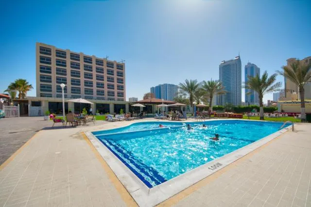  Ajman Beach Hotel - picture  : Property building,Swimming pool,Swimming pool,Property 
