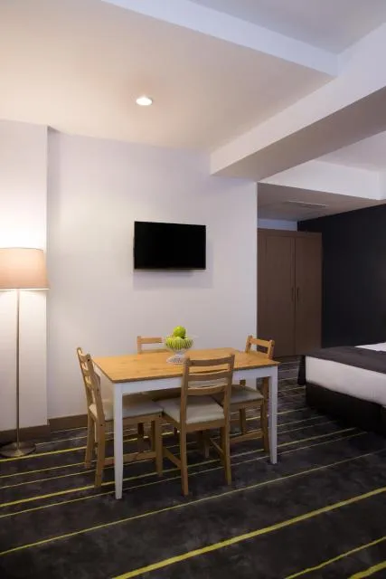  Nova Hotel Yerevan - picture  : TV/entertainment centre,Kitchen or kitchenette,Decorative detail,Seating area,Bedroom,Property 