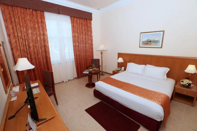  Sharjah Premiere Hotel & Resort - picture  : Bed,Bedroom,Property 