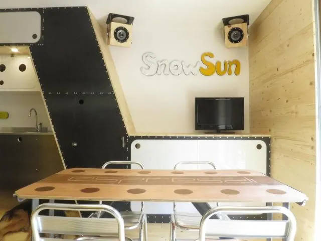  SnowSun -Vacances Pirinenca - picture  : TV/entertainment centre,Property logo or sign,Property 