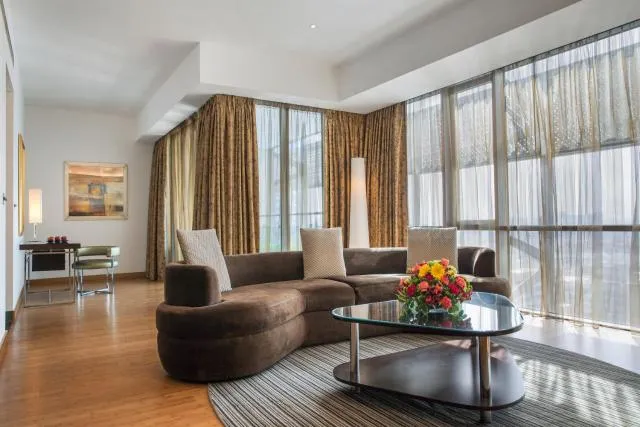  Burjuman Arjaan by Rotana - Dubai - picture  : Patio,Seating area,Balcony/Terrace,Living room,Seating area,City view,Property 