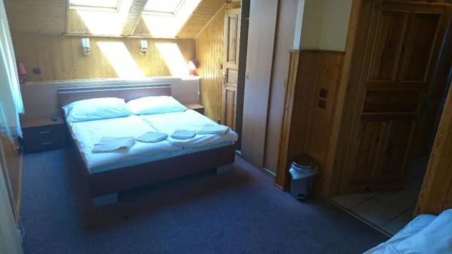  Penzion U Zvonku - picture  : Property building,Restaurant/places to eat,Bed,Property 