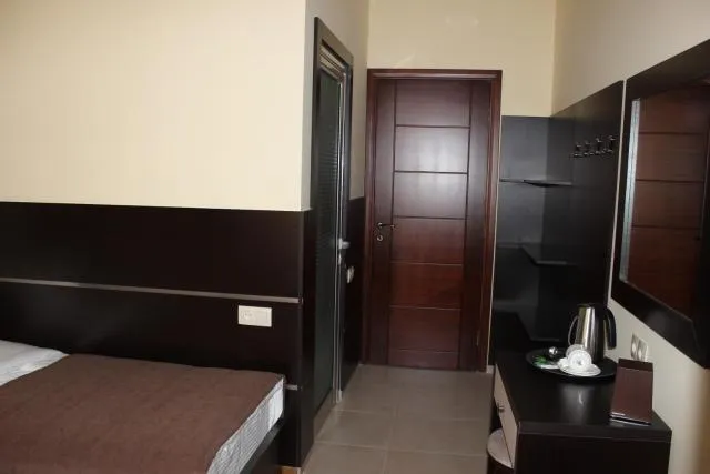  Hotel Lilia Yerevan - picture  : TV/entertainment centre,Bed,Bedroom,Property 